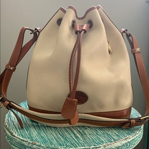 Dooney & Bourke Handbags - Dooney & Bourke Pebbled Leather Cinch Bucket Bag